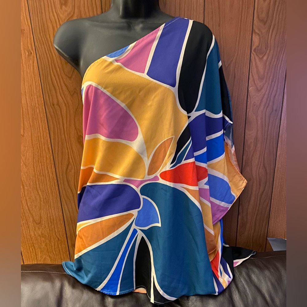 Off the shoulder blouse is an array of beautiful colors